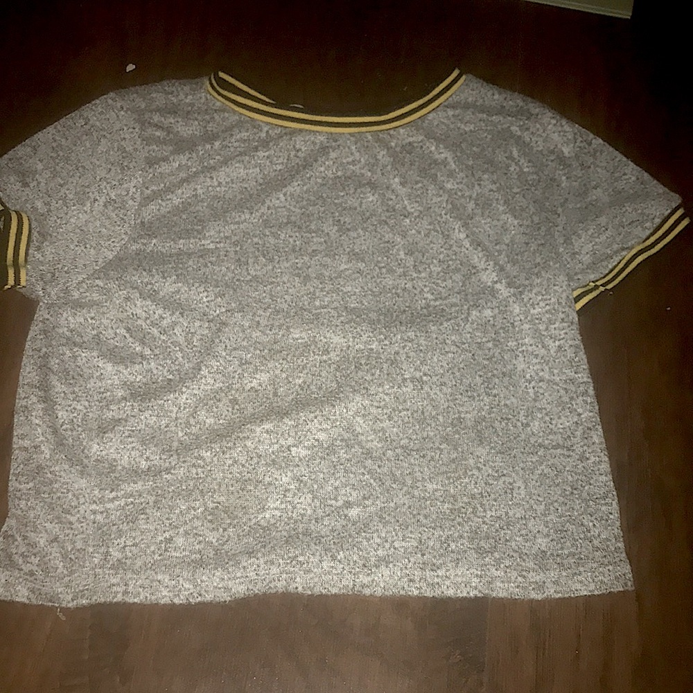 Foggy grey shirt with black and yellow striped collar and sleeves